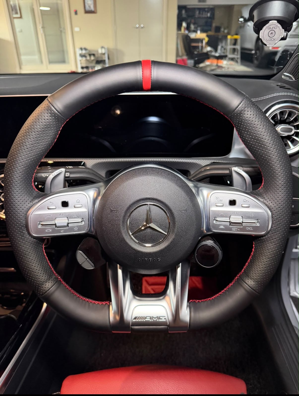 Protected original steering wheel underneath the wrap